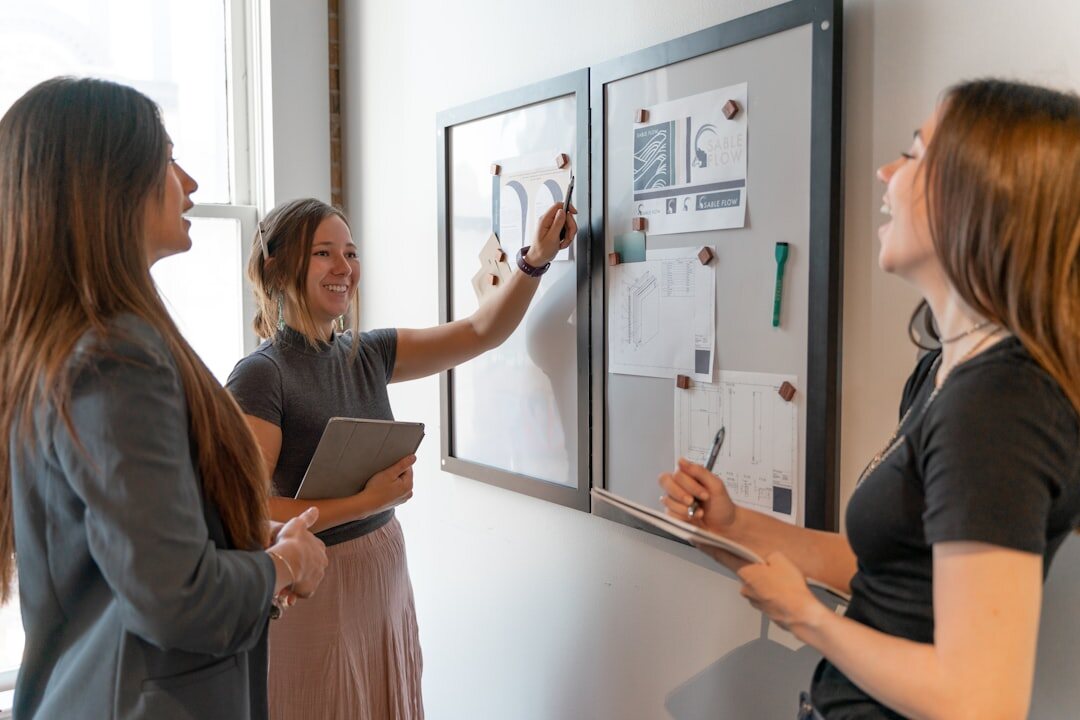 Editorial planning session with team around whiteboard