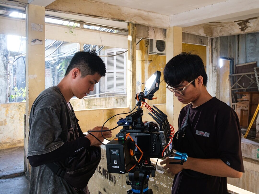Young journalists collaborating on digital content production