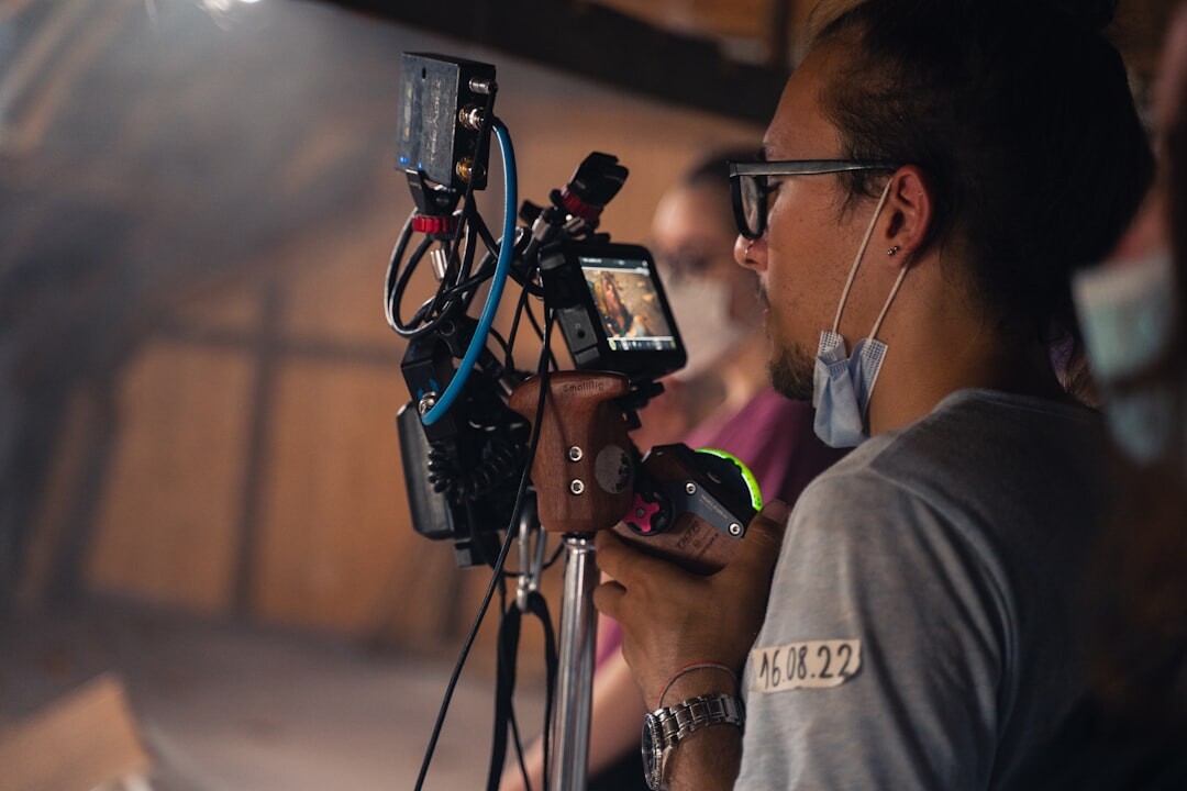 Journalist interviewing a source with microphone and camera